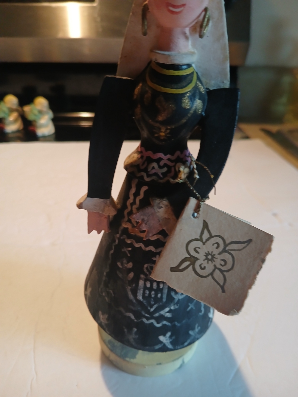 Hand-Painted Folk Art Wooden Doll in Black & Gold